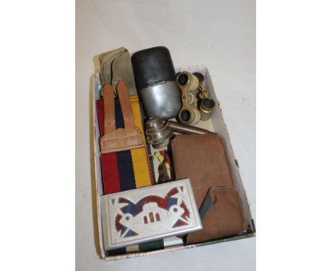 A box of military and other items to include a cigarette case inscribed "Lilly Marlen, Egypt", a pewter and leather covered g