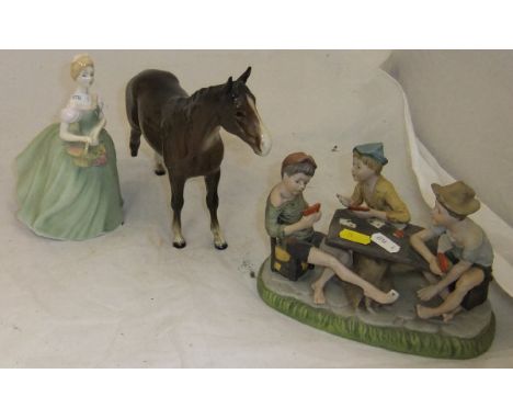 A Beswick figure of a donkey, a Beswick figure of a chestnut hunter (No. 73), a capo-di-monte style figure group of young boy