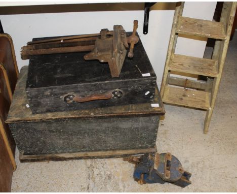 A vintage pine tool chest containing a collection of various vintage tools, a black painted vintage tool case containing  vin
