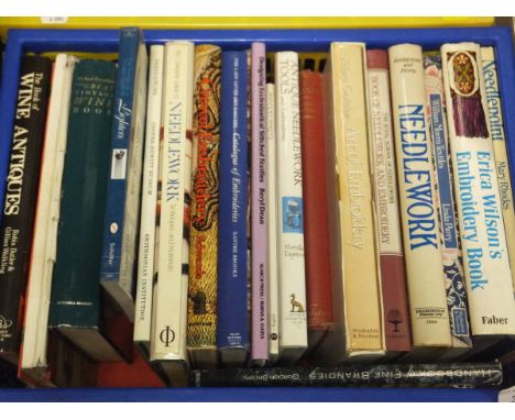 Two boxes of assorted hardback books relating to textiles, needleworks, alcohol, silver and jewellery to include "Antique Nee