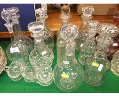A collection of decanters and other glassware to include various 19th Century ring-necked decanters, a decanter etched with f