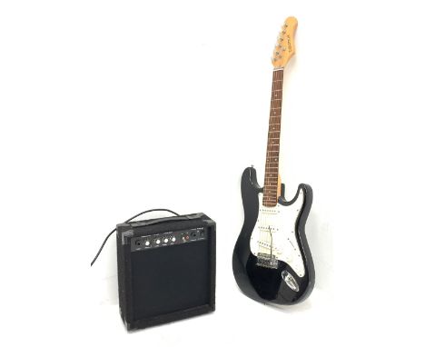 An Elevation electric guitar, together with a Clarity JE22 amplifier.  - Condition Report 