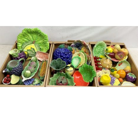 A large collection of various fruit and veg modelled and decorated wares, to include assorted plates, bowls, cruets, jugs, et