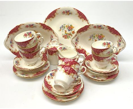 A Paragon Rockingham pattern tea set, comprising seven teacups and eight saucers, eight side plates, sucrier and cover, milk 