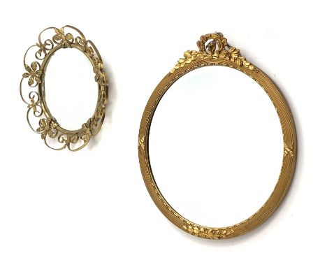 An Antique style mirror, or circular form with foliate detail, D51cm, together with another Vintage style mirror, of circular