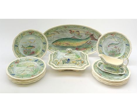 A Copeland Spode fish service, comprising twelve plates, oval serving platter, tureen and cover and sauce jug and stand, plat