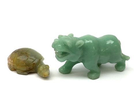 Two carved jade figures, the first modelled as a tiger, L10.5cm, the second as a turtle, L6.5cm.  - Condition Report 
