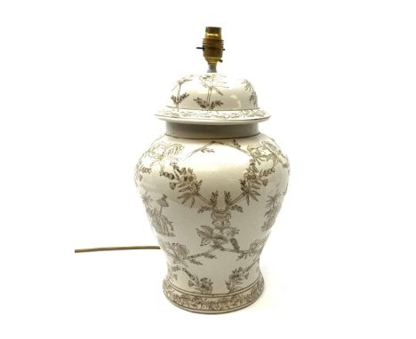 An India Jane ceramic table lamp, of baluster form, the white ground detailed with foliate and figural decoration in grey, ov