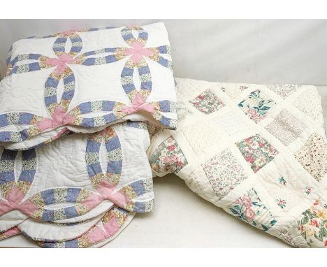 A Vintage style patchwork double quilt or bed spread, together with two single examples.  - Condition Report 