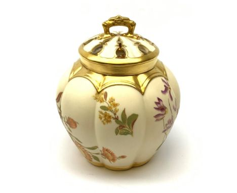 A Royal Worcester blush ivory potpourri jar and cover, with inner cover, of lobed ovoid form decorated with flowers and heigh