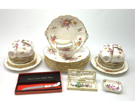 A selection of Royal Crown Derby Derby Posies pattern dinner and tea wares, comprising eight dinner plates, two salad plates,