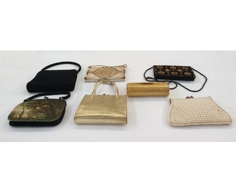 Gilt metal hard cased evening bag with diamante detail to the clasp, a beaded evening bag, a gold leather bag with two handle