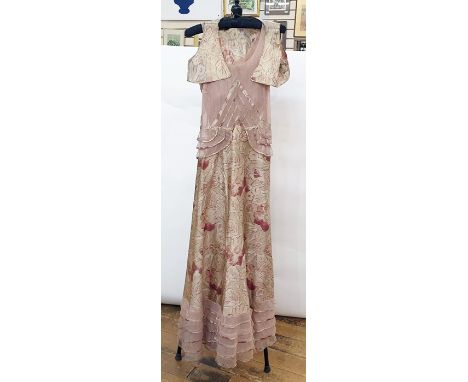 1930's net and watered silk lame dress with frilled hem in five tiers, diagonal design on the net bodice with a small peplum 