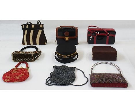 Quantity of vintage handbags as shownCondition Reportthe black and white hide bag is worn in the corners of the base, the oth