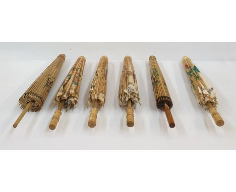 Seven various vintage Japanese paper parasols and a vintage cotton umbrella with frilled edge and wooden handle (8)