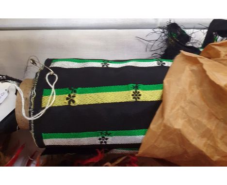 1950's vintage material, roll, black with green and white stripe with daisy detail in balck, paper around the roll dated 1956