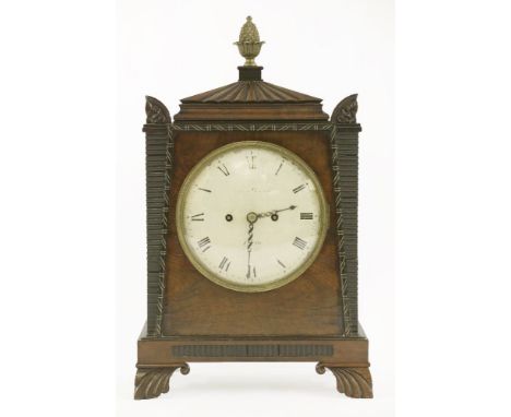 A mahogany bracket clock,19th century, the case in the manner of Thomas Hope, the painted convex dial inscribed 'Thos.Sherwoo