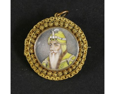 An Indian portrait miniature on ivory,mid-19th century, Ranjit Singh, mounted in a contemporary high carat gold brooch/pendan