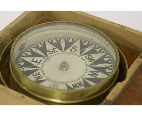 H Hughes & Son,a gimbal compass in a later case,16.5cm diameter