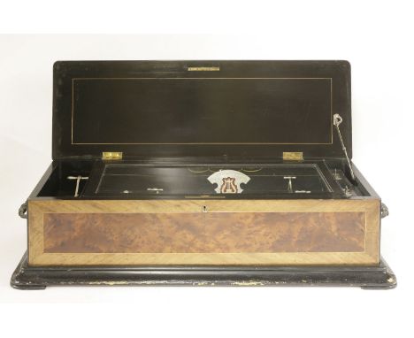 A Nicole Frères interchangeable musical box,serial no. 51793, the four cylinders playing eight airs each, twin spring driven 