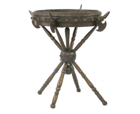 An unusual planter,late 19th/early 20th century, modelled as crossed axes supporting an oval shallow planter, tin-lined,97cm 