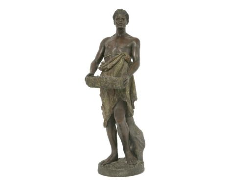 A Goldscheider figure of a Nubian servant,late 19th century, he modelled bare-chested holding a basket, stamped marks and ins