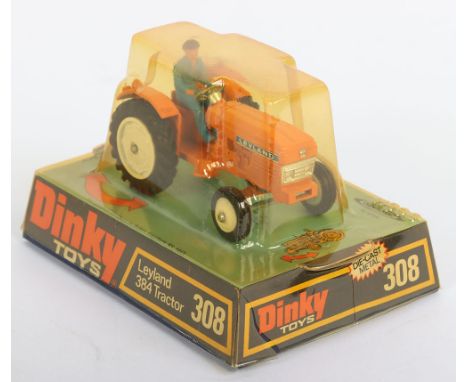 Dinky Toys 308 Leyland 384 Tractor, orange body, white metal rear wheel hubs, front plastic wheel hubs, chimney stack, blue p