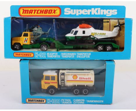 Two Matchbox Superkings K-92 Helicopter Transporter, yellow/green Ford cab, green trailer with green/white/black ‘Heli-Hire I