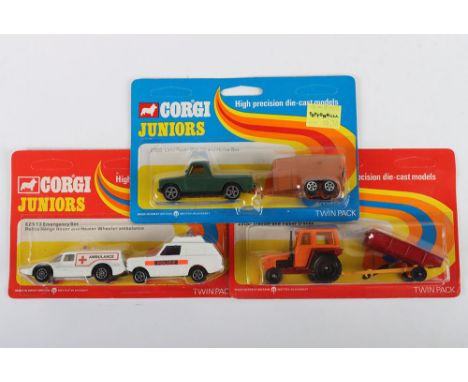 Three Corgi Juniors Twin Packs, E2503 Land Rover Pick Up & Horse box, E2513 Emergency Set Police Range Rover and Healer Wheel