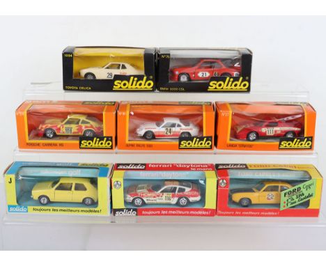 Eight Boxed Solido Models, 1/43 scale, 16 Ferrari Daytona decals have been applied, 19 Volkswagen Golf,27 Lancia Stratos deca