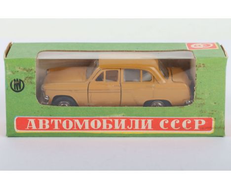 Novexport (Russian)  No A7 Moskvitch 403 Diecast Model, 1:43 scale, light tan/brown  body, black metal base, white interior, 