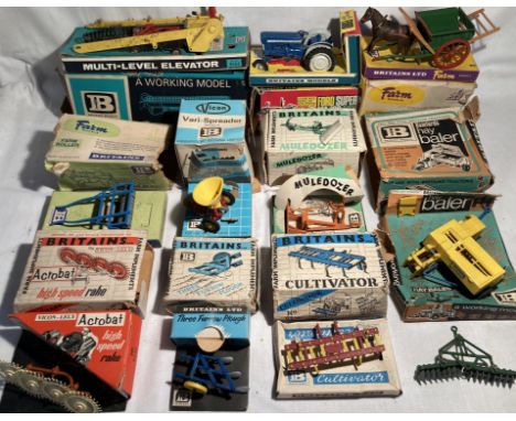 Britains: A collection of assorted Britains farm implements and figures to include: Ford 5000 Tractor, Tumbrel Cart, Elevator