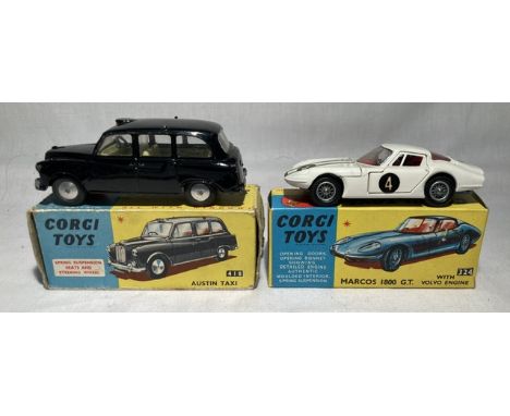 Corgi: A pair of boxed Corgi Toys, Marcos 1800 G.T. with Volvo Engine, Reference No. 324; and Austin Taxi, Reference No. 418.