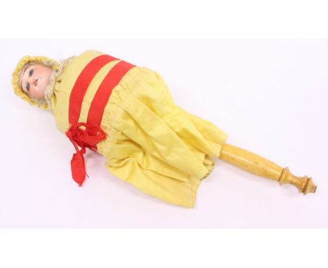 Doll: A late 19th/early 20th century, German, shoulder head bisque marotte doll, blue fixed eyes, open mouth revealing four t