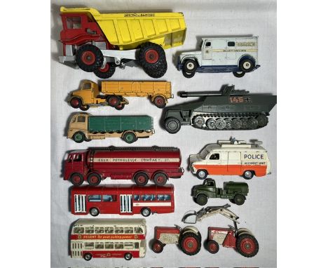 Dinky: A collection of playworn vintage Dinky vehicles to include: Leyland Octopus Esso Tanker, Police Ford Transit, Brinks S