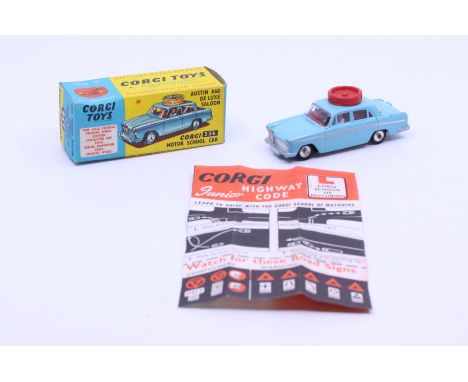 Corgi: A boxed Corgi Toys, Austin A60 De Luxe Saloon, Corgi Motor School Car, Reference No. 236. Light-blue livery with red w