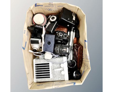 A box of vintage cameras and camera equipment