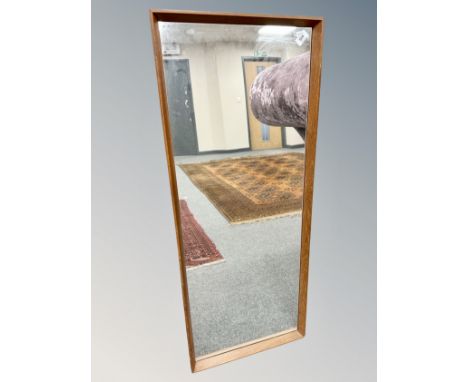 A 1970's teak framed mirror, 45cm by 110cm
