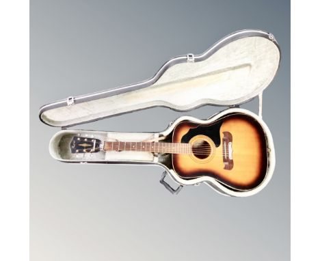 A German Framus acoustic guitar in fitted case, model 51796, serial number 19044. CONDITION REPORT: Condition looks good, gen