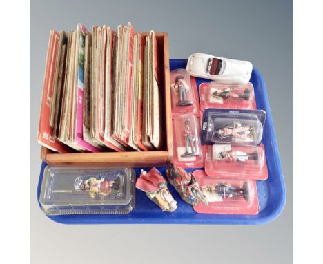 A tray of vintage folded Ordnance Survey maps, together with Delprado metal soldiers 