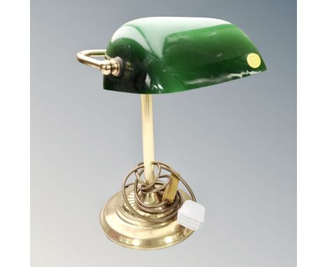 A brass banker's lamp with green glass shade 