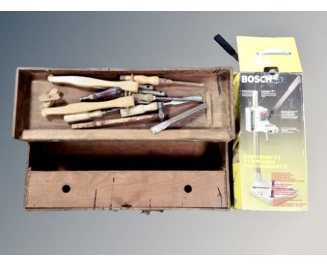 A joiner's tool box containing hand tools together with Bosch drill stand, boxed.