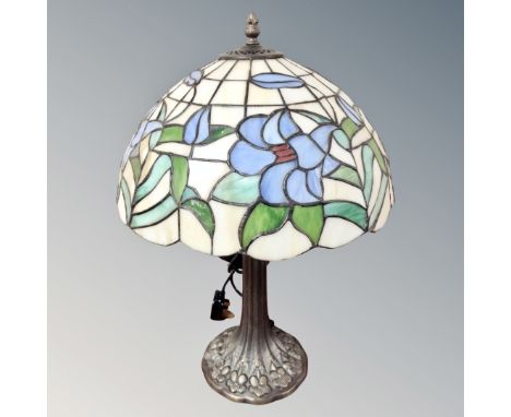 A Tiffany style table lamp with leaded glass shade 