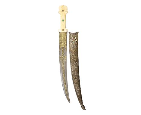 AN OTTOMAN CORAL-AND TURQUOISE-MOUNTED DAGGER (JAMBIYA), NORTH AFRICA, MID-19TH CENTURY with curved double-edged blade formed