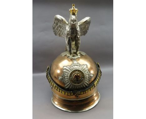 A WELL MADE COPY OF A PRUSSIAN GARDE DU CORPS OFFICER'S HELMET OF CIRCA 1914-18, MODERN with copper skull fitted with leather