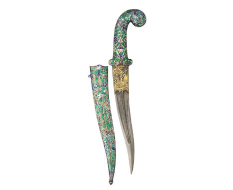 ‡ AN INDIAN DAGGER WITH ENAMELLED SILVER MOUNTS, LATE 19TH/20TH CENTURY with slightly recurved double-edged blade formed with