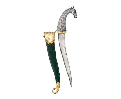 ‡ A FINE INDIAN SILVER-HILTED DAGGER (KHANJAR), 18TH CENTURY with slightly recurved blade of watered steel, formed with a rei
