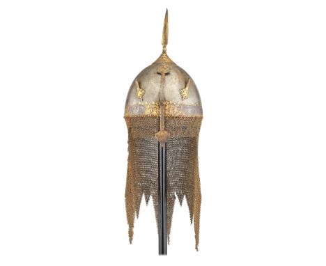 ‡ A PERSIAN HELMET (KULAH-KHUD), QAJAR, FIRST HALF OF THE 19TH CENTURY with hemispherical skull fitted at its apex with a sha