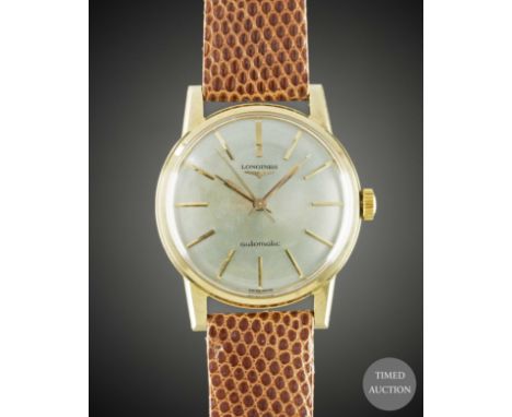 A GENTLEMAN'S 18K SOLID GOLD LONGINES AUTOMATIC WRIST WATCH
CIRCA 1960s, REF. 7006 WITH ENGINE TURNED DIAL

Movement:&nbsp;24