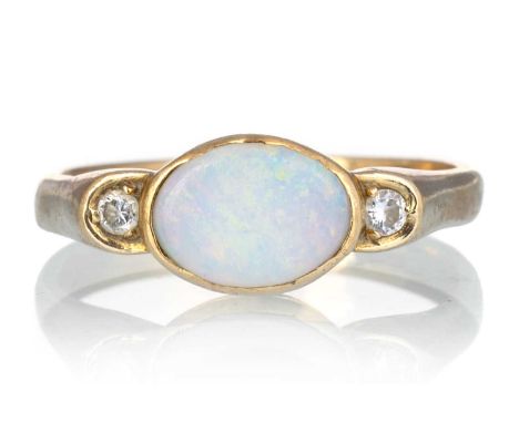 OPAL AND DIAMOND THREE STONE RING, set with a central opal flanked by two small diamonds, indistinctly marked, size LQty: 2.6